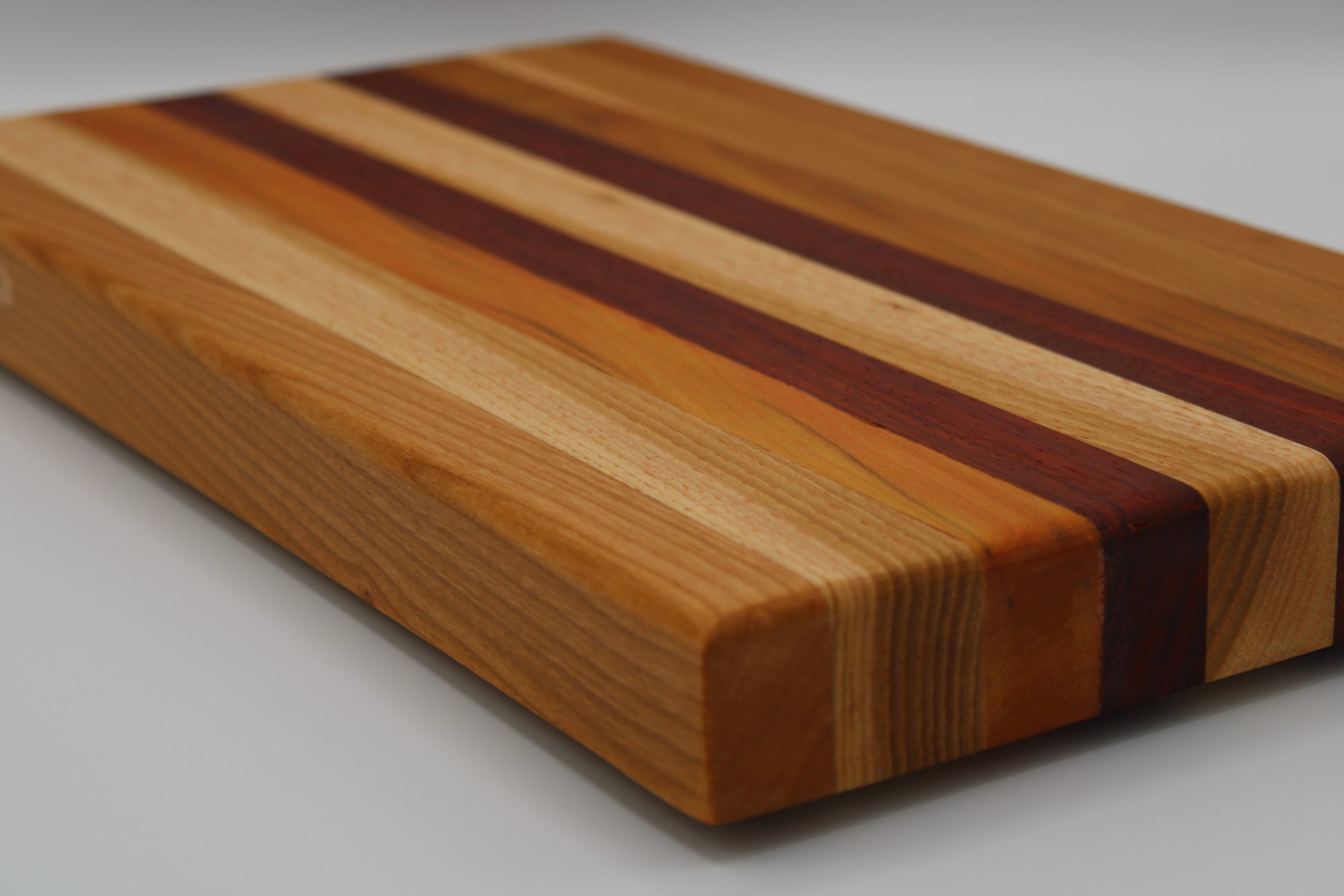 Design #040 wood used Cherry, Padauk, Yellowheart and Hickory 16x19x1.25