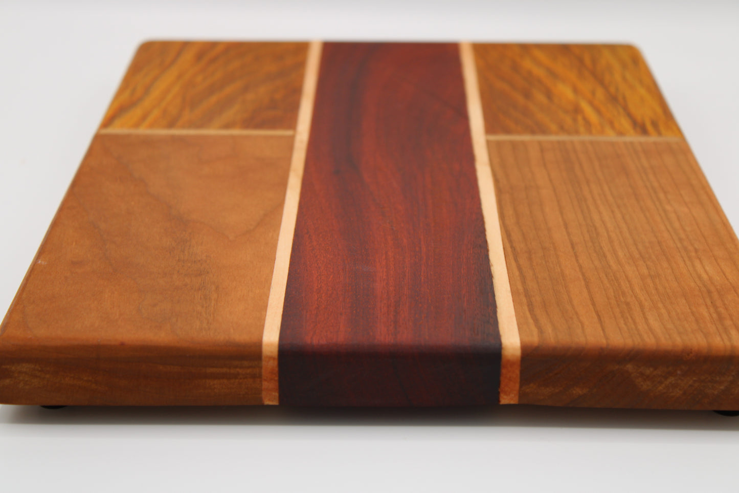 Design #039 wood used Cherry, Padauk and Canarywood 14x10x1