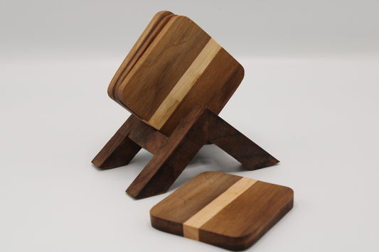 Wooden coasters with a striped design  in a stand on a white background