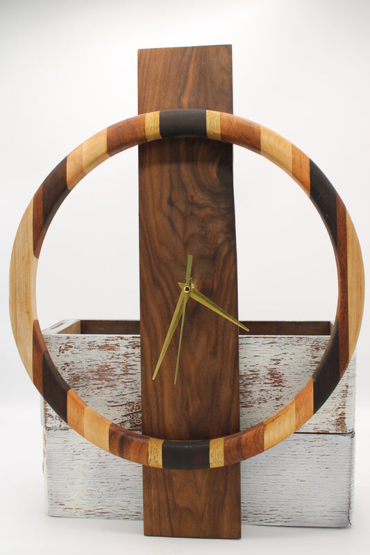 Wooden wall clock with a circular design on a wooden background