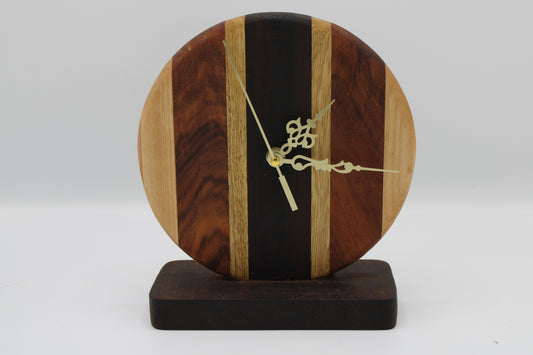 Wooden clock with a unique design on a white background