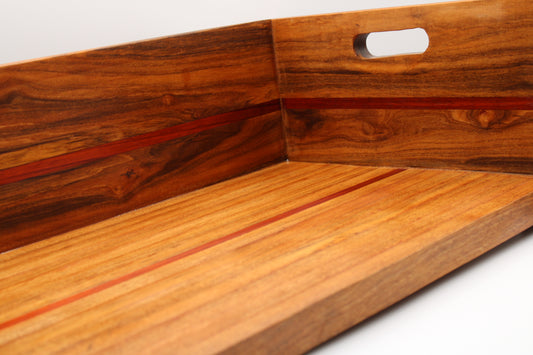 Wooden BBQ Chopping Box with a handles on a light gray background