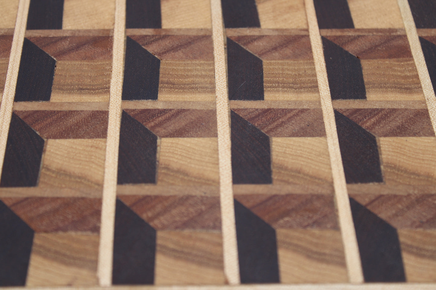 Wood cutting board with three dimensional design