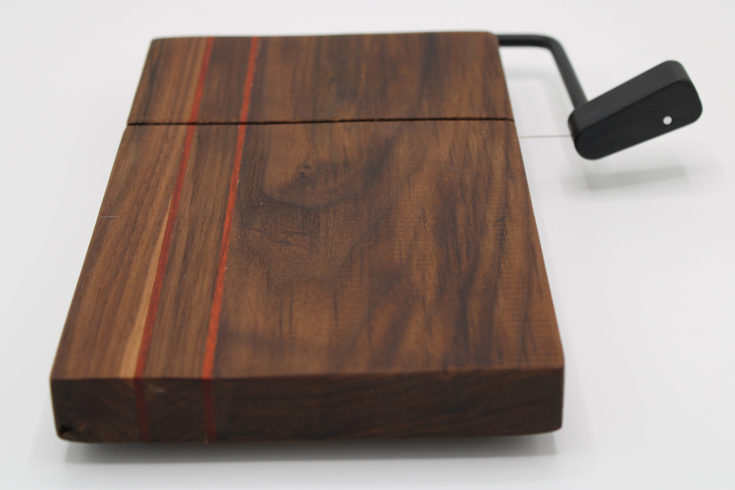 Wooden cheese board with cutter