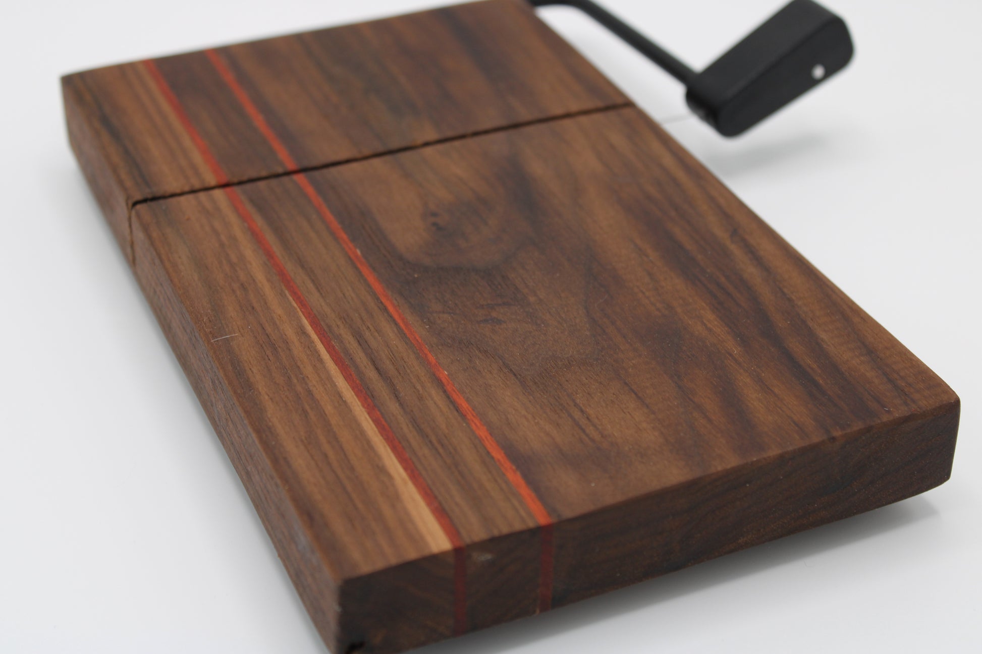 Wooden cheese board with cutter
