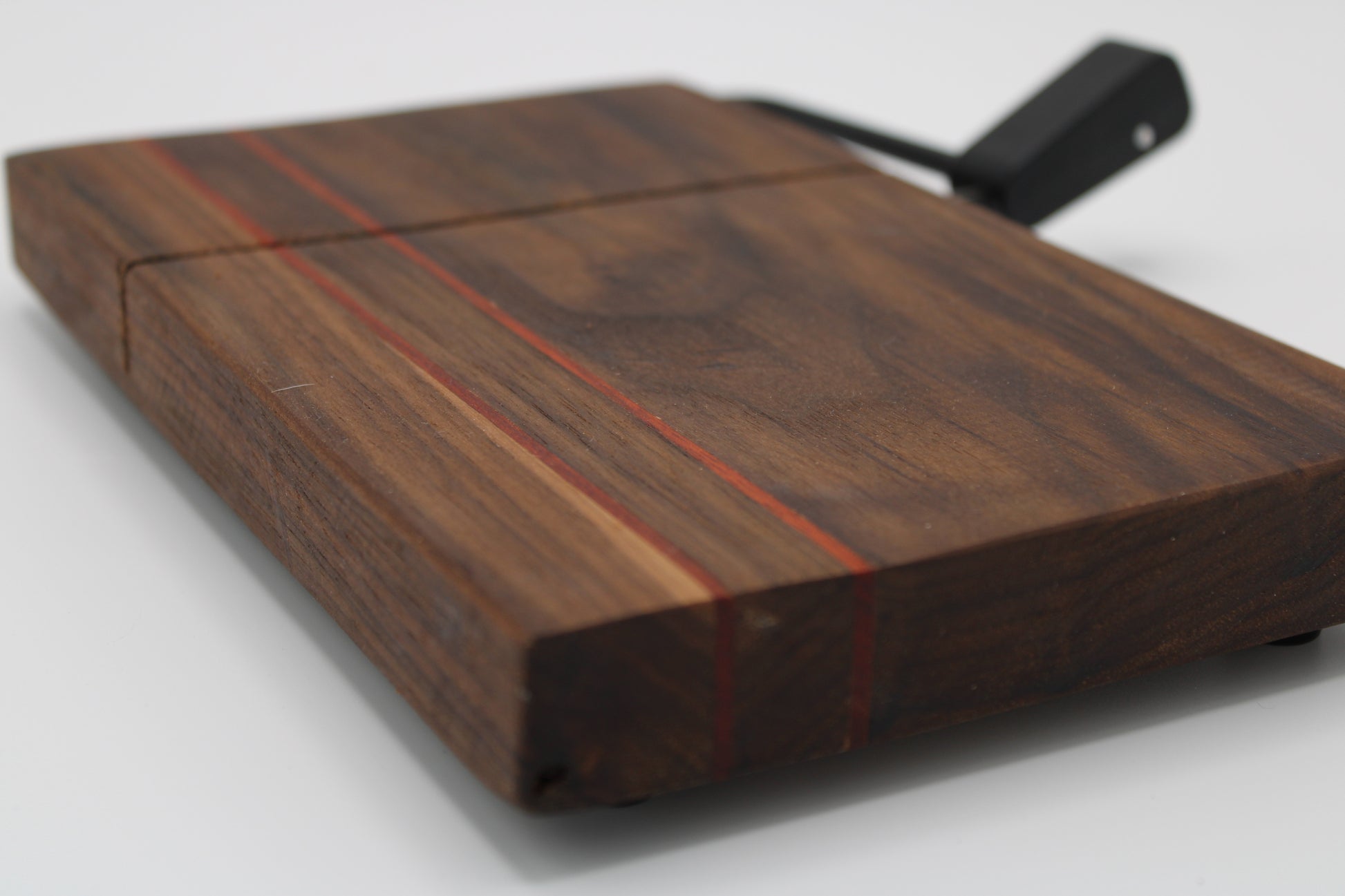 Wooden cheese board with cutter