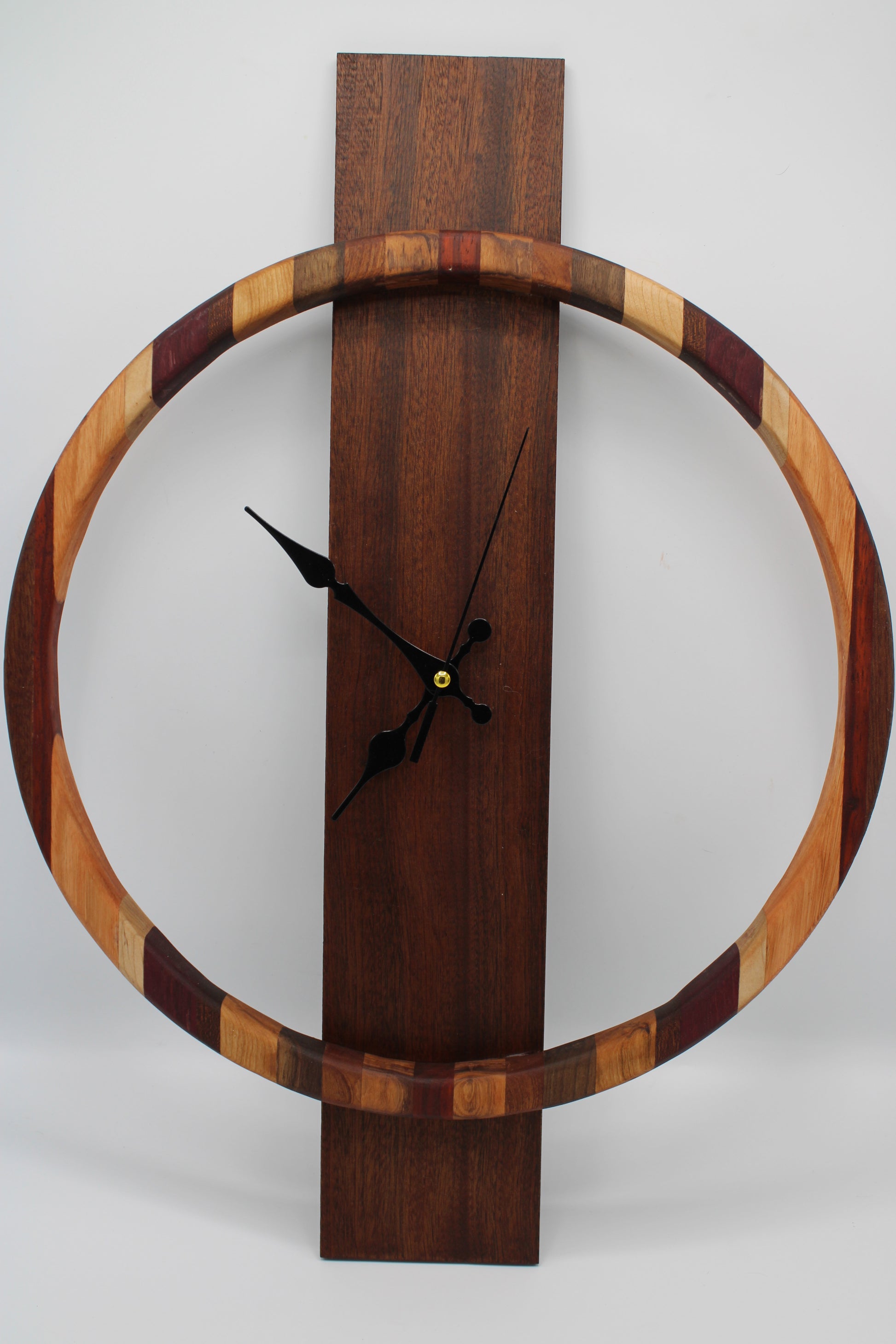 Wood clock with striped ring and solid board backing