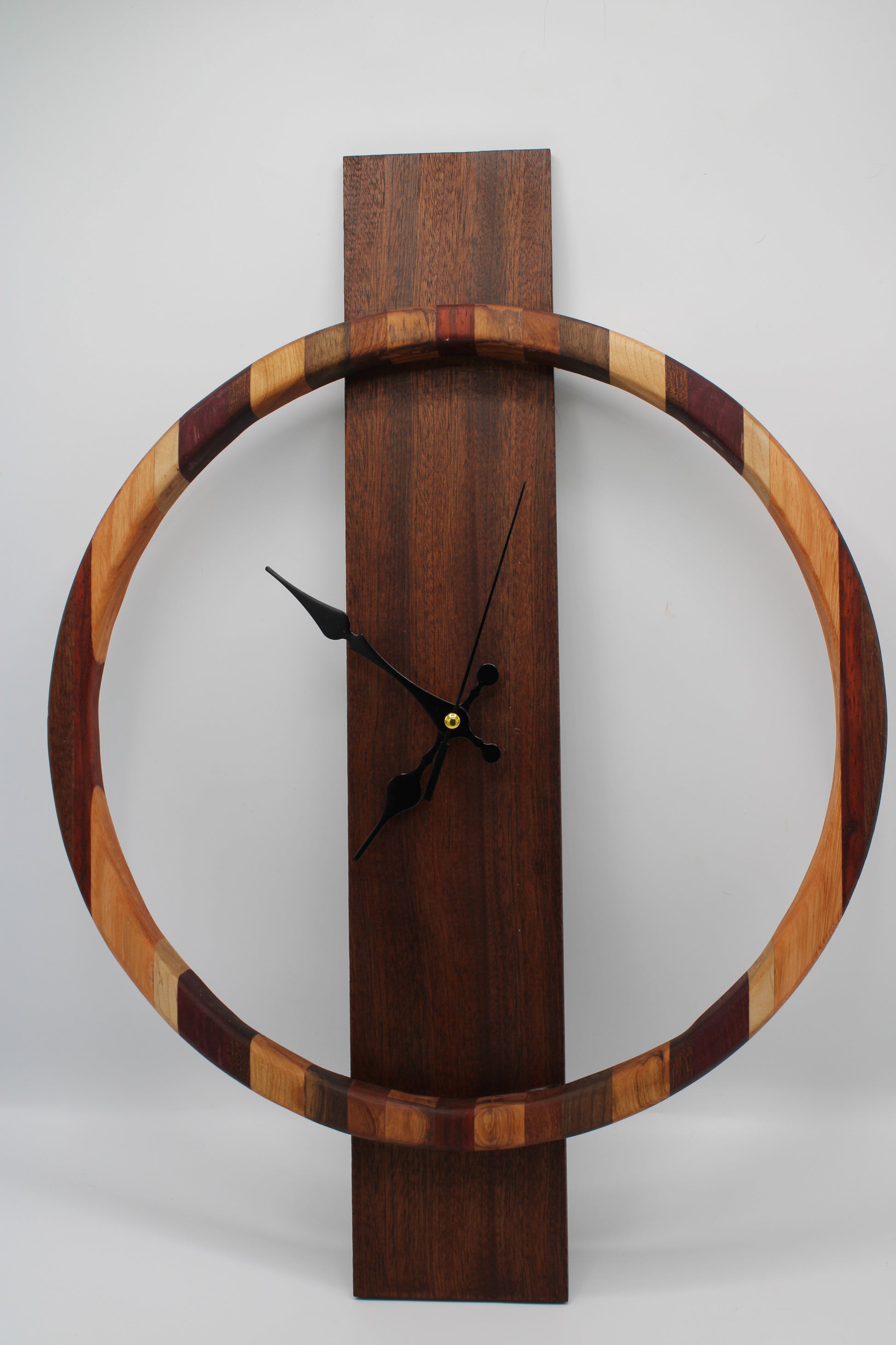 Wood clock with striped ring and solid board backing