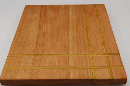 Wood cutting board with corner weave detail