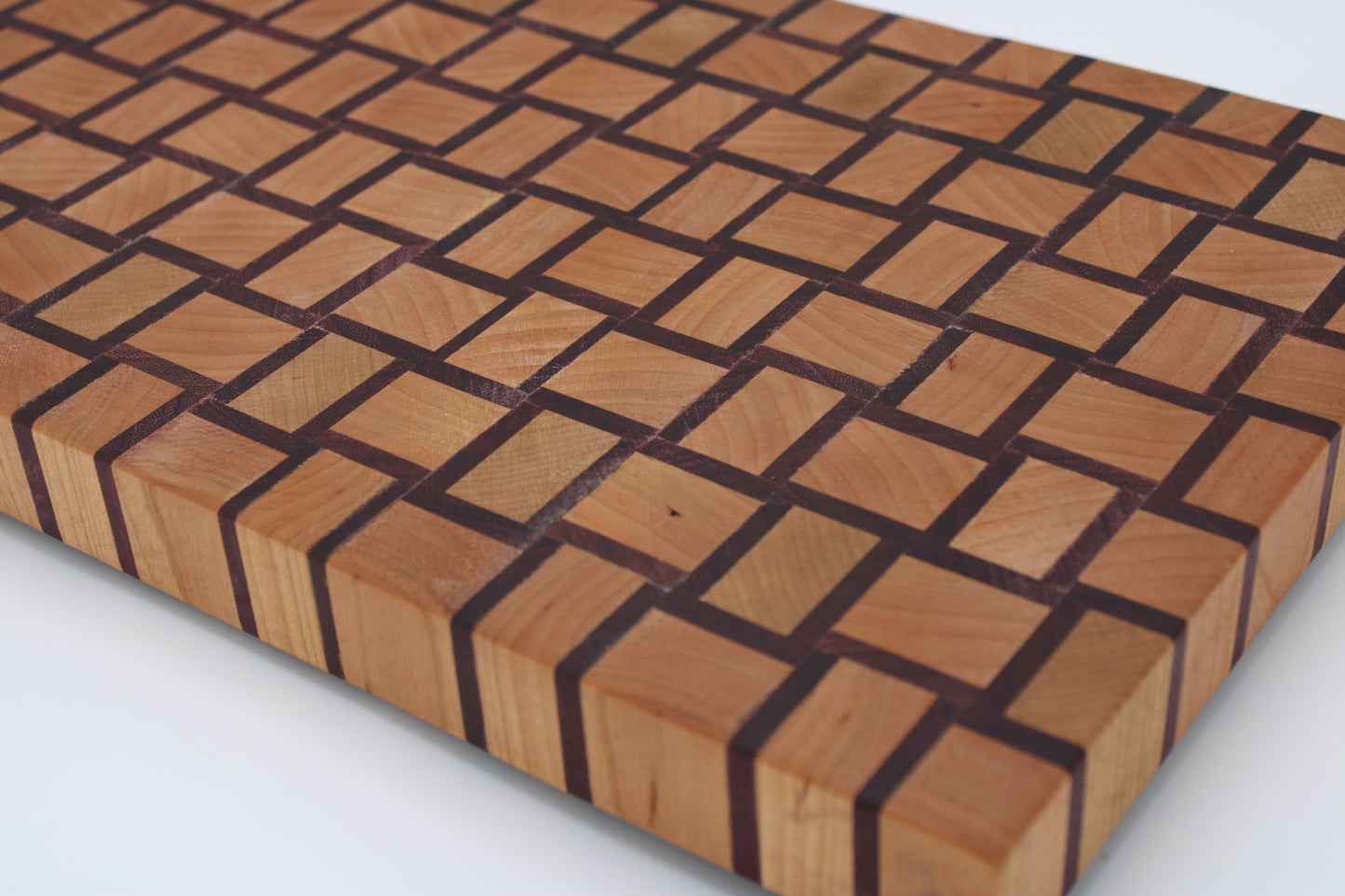 wood cutting board with basket weave pattern