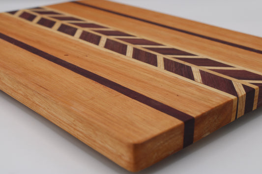 Wood cutting board chevron design and stripes