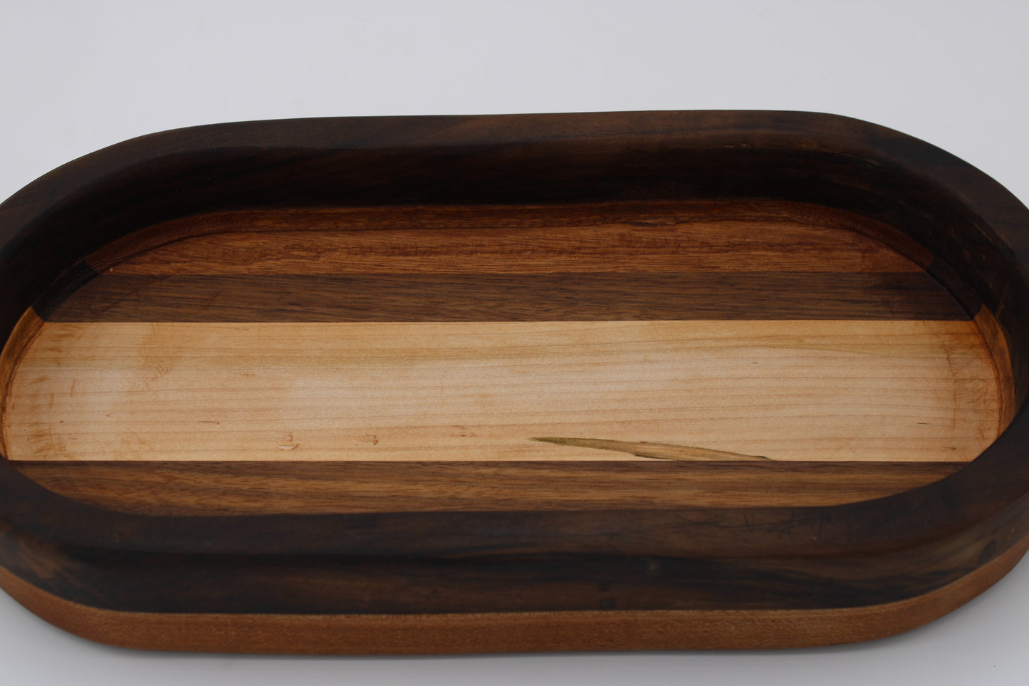 Wood bowl with stripes in brown, tan and  cream