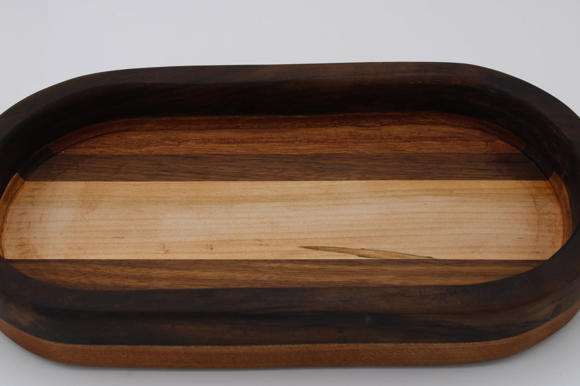 Wood bowl with stripes in brown, tan and  cream