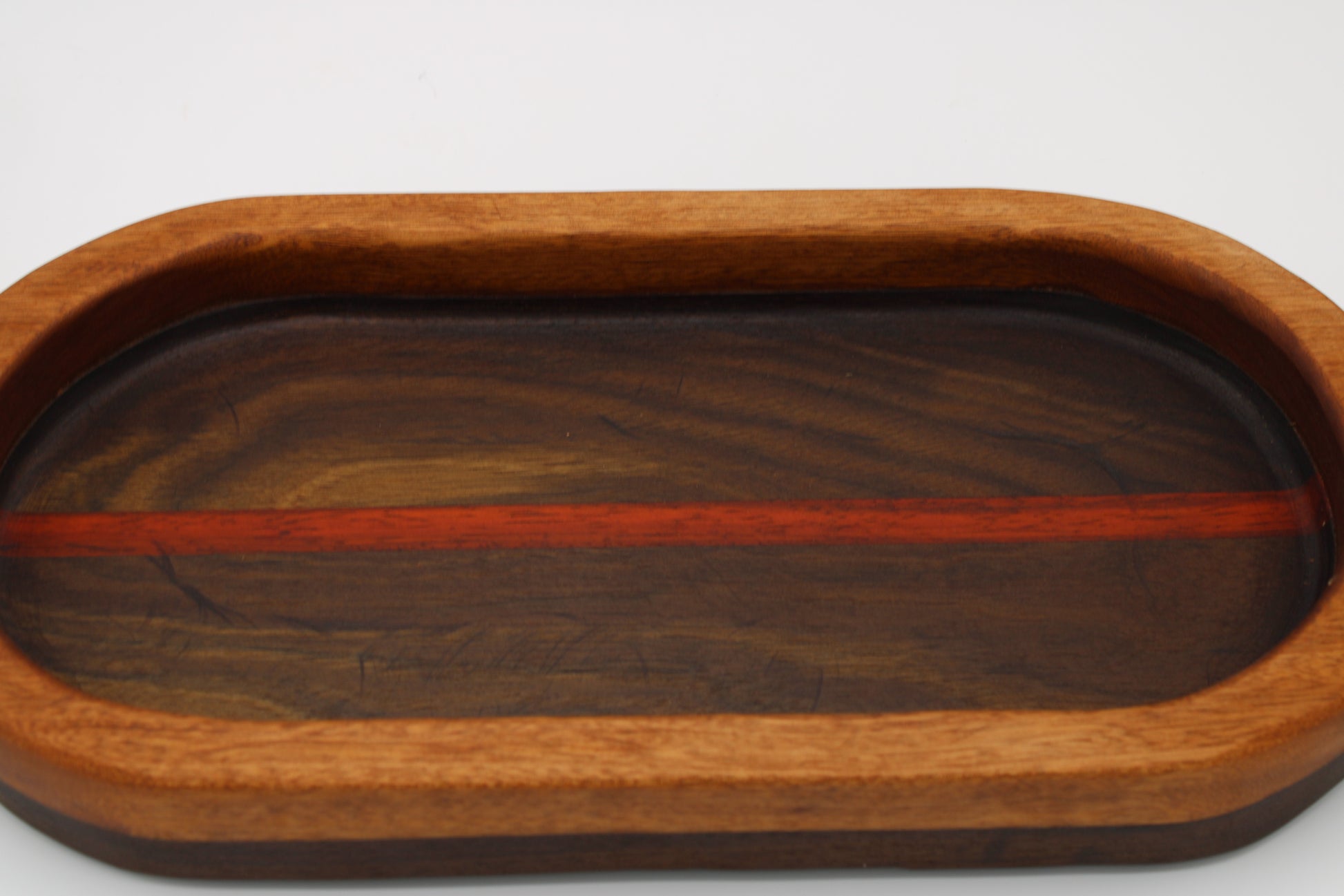 Wood bowl with stripes in brown, tan and  red