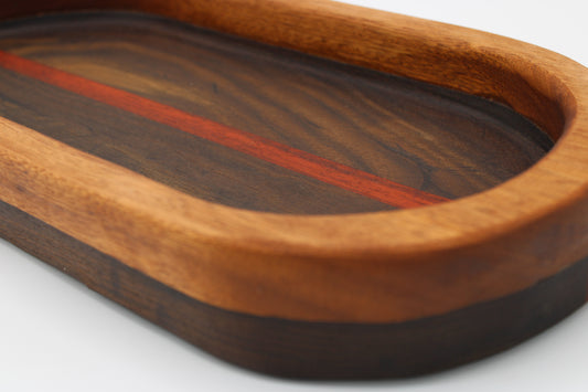 Wood bowl with stripes in brown, tan and  red