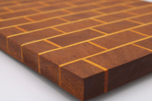Wooden cutting in running bond pattern in medium brown and orange