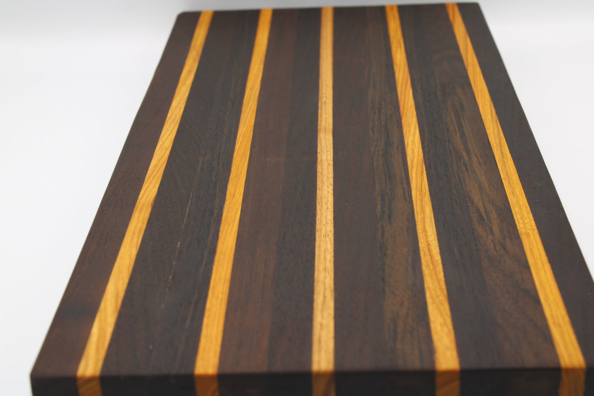 Striped Wooden cutting board in dark brown and orange