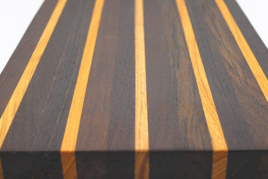 Striped Wooden cutting board in dark brown and orange